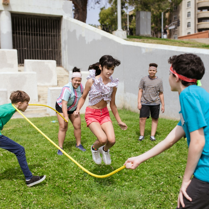 Children skip rope at summer camp